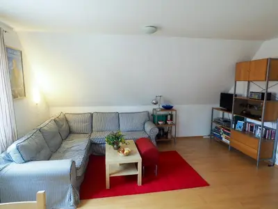 Ein Sitzbereich in der Unterkunft Historisches Bauernhaus Zingst Ferienwohnung Meuder-Heuboden