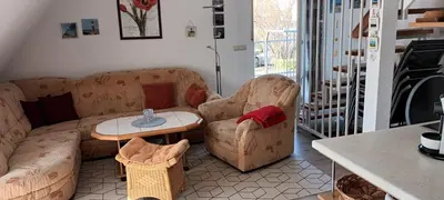 Ein Sitzbereich in der Unterkunft Haus Seeschwalbe Wohnung 6