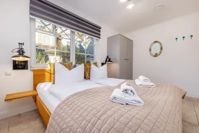 Ein Bett oder Betten in einem Zimmer der Unterkunft Whg Dynamique