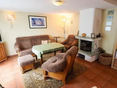 Ein Sitzbereich in der Unterkunft Historisches Bauernhaus Zingst Ferienwohnung Meuder-Tenne