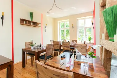 Ein Sitzbereich in der Unterkunft Restaurant & Pension Eshramo