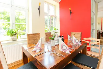 Ein Sitzbereich in der Unterkunft Restaurant & Pension Eshramo