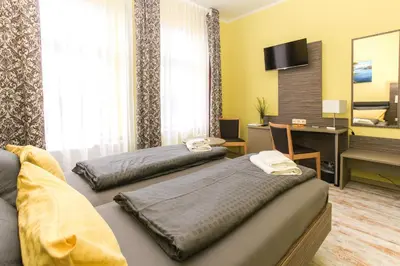 Ein Bett oder Betten in einem Zimmer der Unterkunft Restaurant & Pension Eshramo