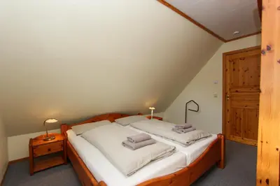 Ein Bett oder Betten in einem Zimmer der Unterkunft Haus Seehof