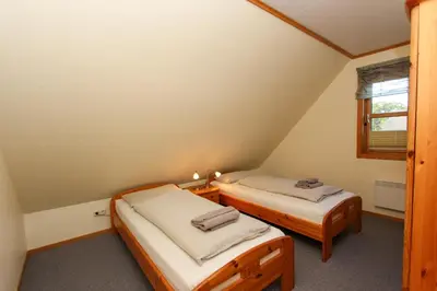 Ein Bett oder Betten in einem Zimmer der Unterkunft Haus Seehof