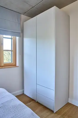 Ein Bett oder Betten in einem Zimmer der Unterkunft Das Ferienhus – Mann & Fru - EG