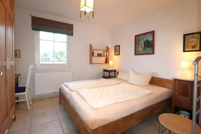 Ein Bett oder Betten in einem Zimmer der Unterkunft Ferienhaus Krull - Gerhards Ferienwohnung