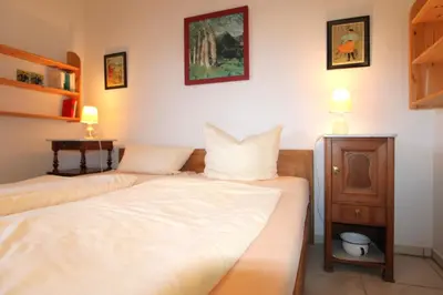 Ein Bett oder Betten in einem Zimmer der Unterkunft Ferienhaus Krull - Gerhards Ferienwohnung