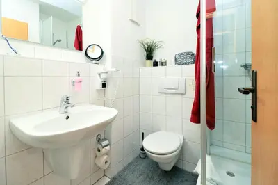Ein Badezimmer in der Unterkunft Deutsches Haus Zimmer 25