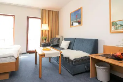 Ein Sitzbereich in der Unterkunft Deutsches Haus Zimmer 25