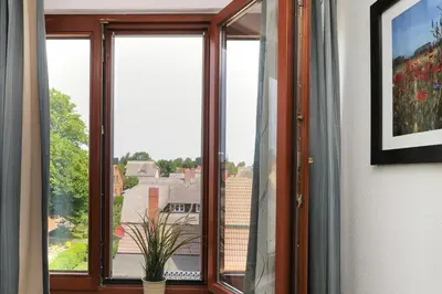 Ein Garten an der Unterkunft Deutsches Haus Zimmer 33
