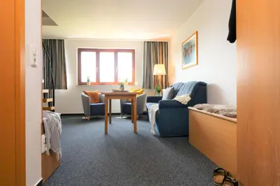 Ein Sitzbereich in der Unterkunft Deutsches Haus Zimmer 33