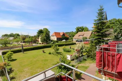 Ein Garten an der Unterkunft Deutsches Haus Zimmer 20