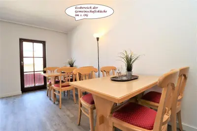 Ein Sitzbereich in der Unterkunft Deutsches Haus Zimmer 28