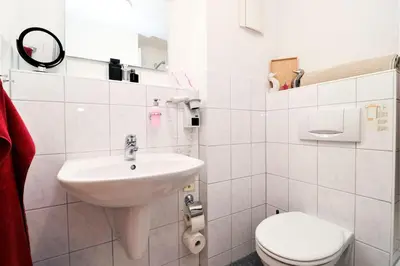 Ein Badezimmer in der Unterkunft Deutsches Haus Zimmer 35