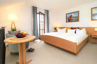 Ein Bett oder Betten in einem Zimmer der Unterkunft Deutsches Haus Zimmer 39