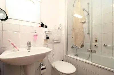 Ein Badezimmer in der Unterkunft Deutsches Haus Zimmer 39