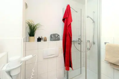 Ein Badezimmer in der Unterkunft Deutsches Haus Zimmer 22