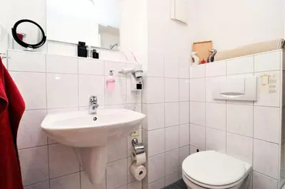 Ein Badezimmer in der Unterkunft Deutsches Haus Zimmer 32