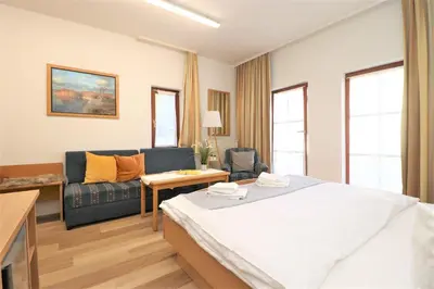 Ein Bett oder Betten in einem Zimmer der Unterkunft Deutsches Haus Zimmer 19 EG