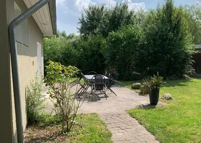 Ein Garten an der Unterkunft zum Schilfrohr