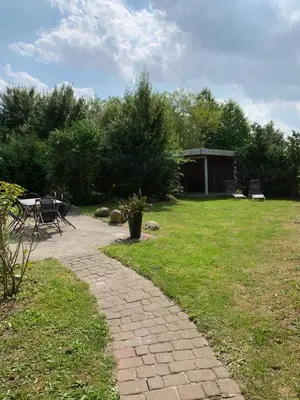 Ein Garten an der Unterkunft zum Schilfrohr