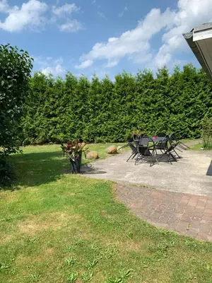 Ein Garten an der Unterkunft zum Schilfrohr