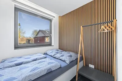 Ein Bett oder Betten in einem Zimmer der Unterkunft Haus Meersinn