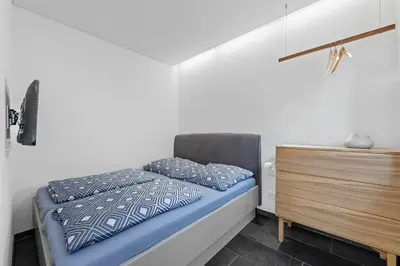 Ein Bett oder Betten in einem Zimmer der Unterkunft Haus Meersinn