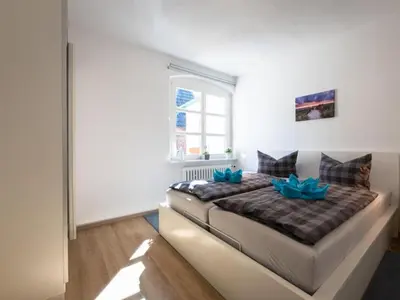 Ein Bett oder Betten in einem Zimmer der Unterkunft Holiday apartment Ahrenshoop