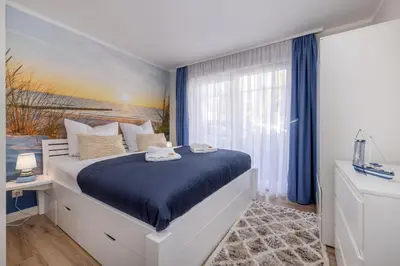 Ein Bett oder Betten in einem Zimmer der Unterkunft FeWo Bianca