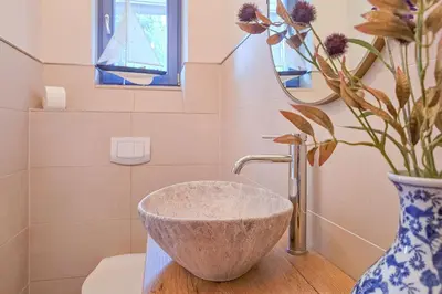 Ein Badezimmer in der Unterkunft Ferienhaus 