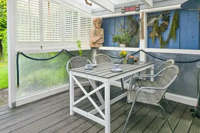 Ein Balkon oder eine Terrasse in der Unterkunft Ferienhaus 