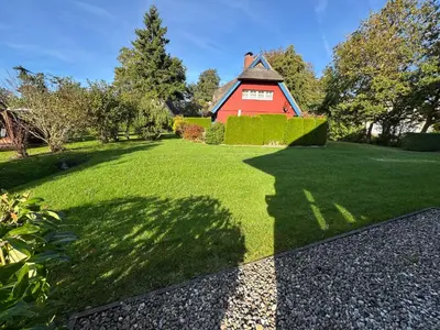 Ein Garten an der Unterkunft Ferienhaus Chausseestraße App 01