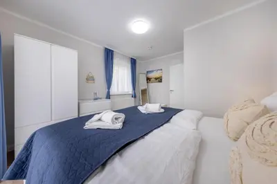 Ein Bett oder Betten in einem Zimmer der Unterkunft FeWo Bianca