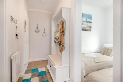 Ein Bett oder Betten in einem Zimmer der Unterkunft FeWo Bianca