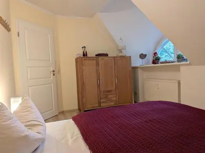 Ein Bett oder Betten in einem Zimmer der Unterkunft Spitzgatt
