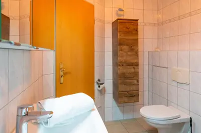 Ein Badezimmer in der Unterkunft Am Deich Haus 36