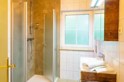 Ein Badezimmer in der Unterkunft Am Deich Haus 36