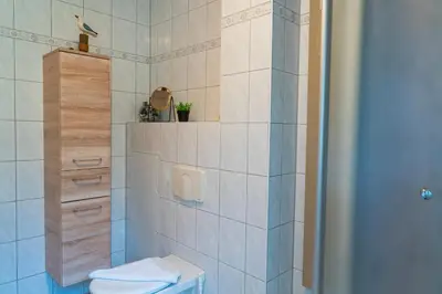 Ein Badezimmer in der Unterkunft Am Deich Haus 32