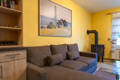 Ein Sitzbereich in der Unterkunft Am Deich Haus 32