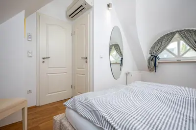 Ein Bett oder Betten in einem Zimmer der Unterkunft Müggenburger Weg 42 - Petersens Kate