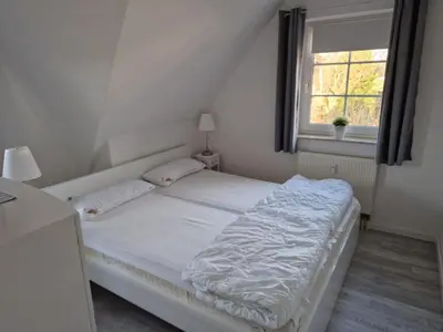 Ein Bett oder Betten in einem Zimmer der Unterkunft Jordanstr 35 Whg 5
