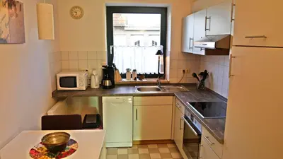 Küche/Küchenzeile in der Unterkunft Ferienhaus Mantuja Ferienwohnung II