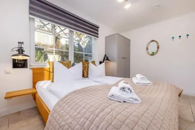 Ein Bett oder Betten in einem Zimmer der Unterkunft Whg Dynamique