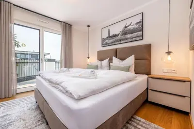Ein Bett oder Betten in einem Zimmer der Unterkunft Strandvilla Zingst-AP 16