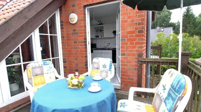 Ein Patio oder anderer Außenbereich in der Unterkunft Birkmaase 12 Kapitänshaus Jacqueline 4-Sterne Komfort Maisonette im OG rechts