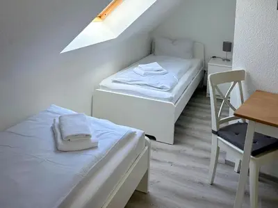 Ein Bett oder Betten in einem Zimmer der Unterkunft Am Deich Haus 18