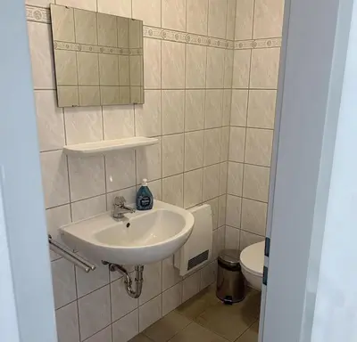 Ein Badezimmer in der Unterkunft Am Deich Haus 18