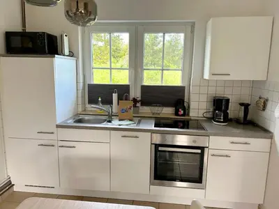 Küche/Küchenzeile in der Unterkunft Am Deich Haus 18